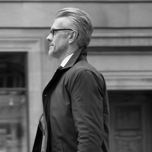 Paradigm-Hair-301 Black and white image of man walking